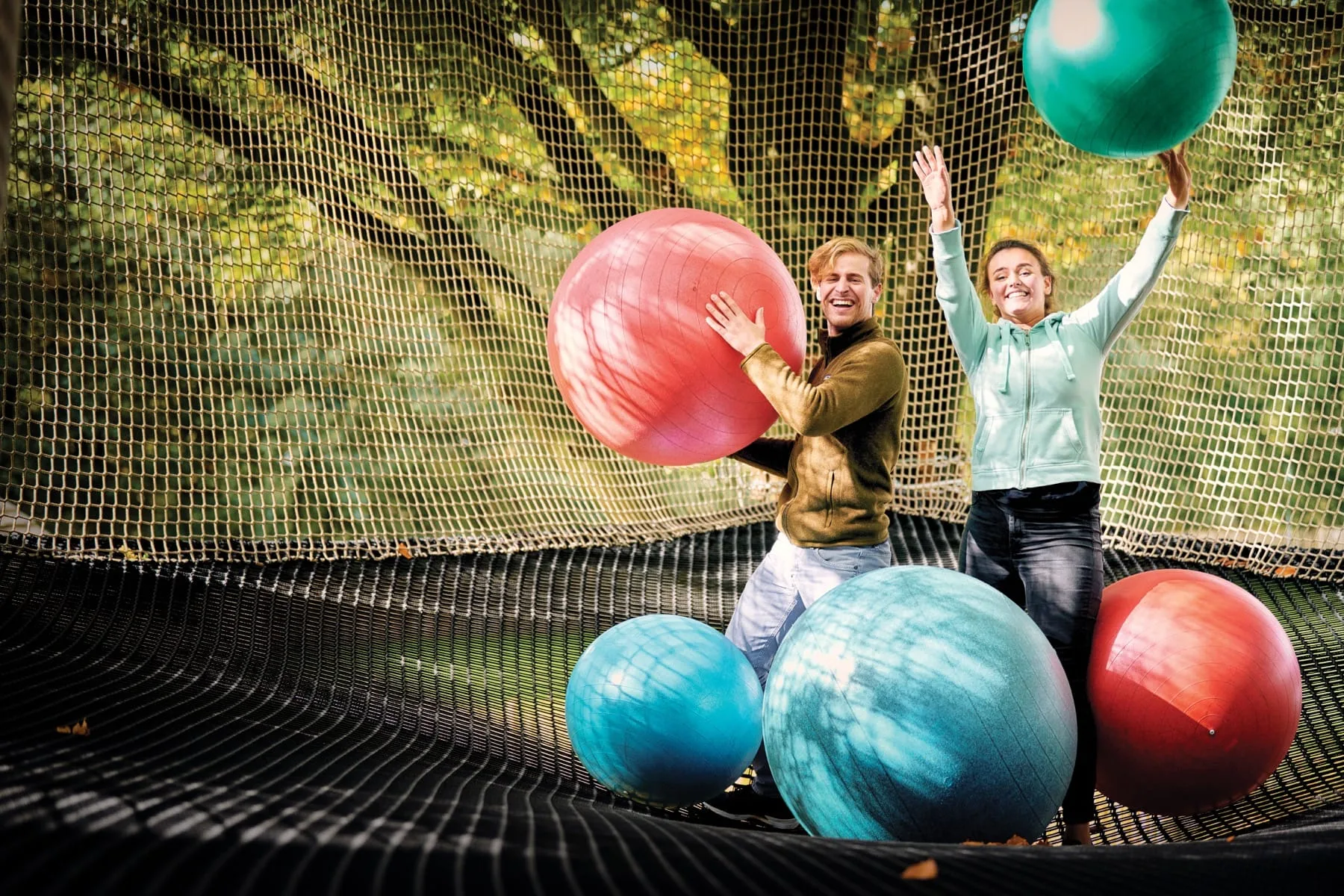 Children play with giant inflatables on the Adventure nets