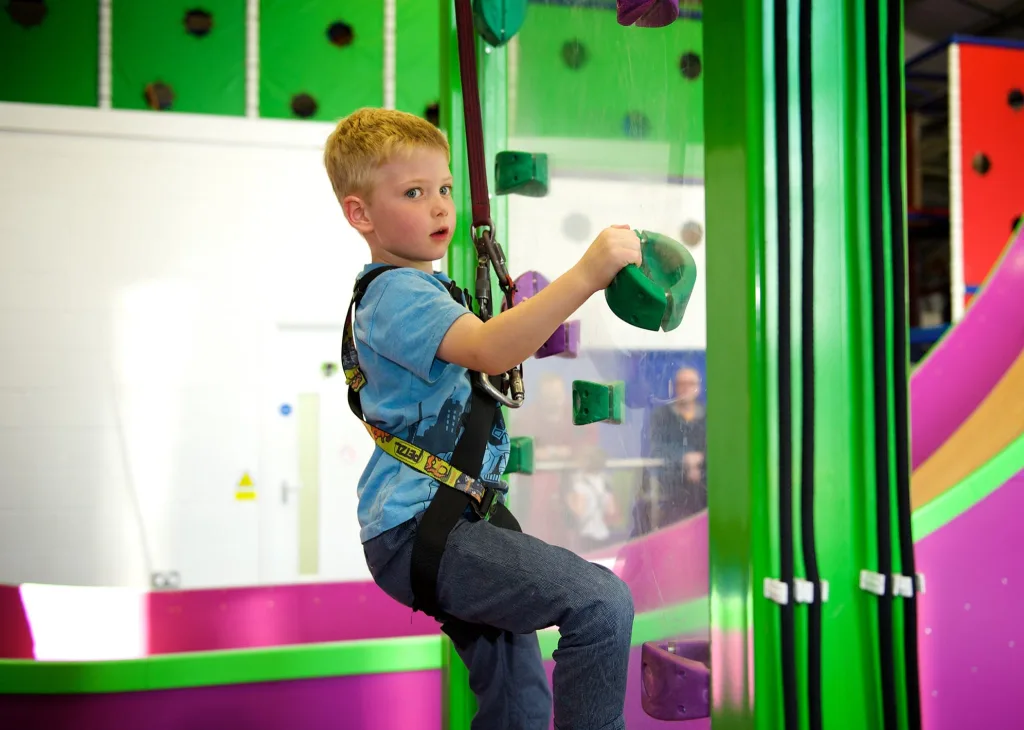 Young child enjoying climbing activity