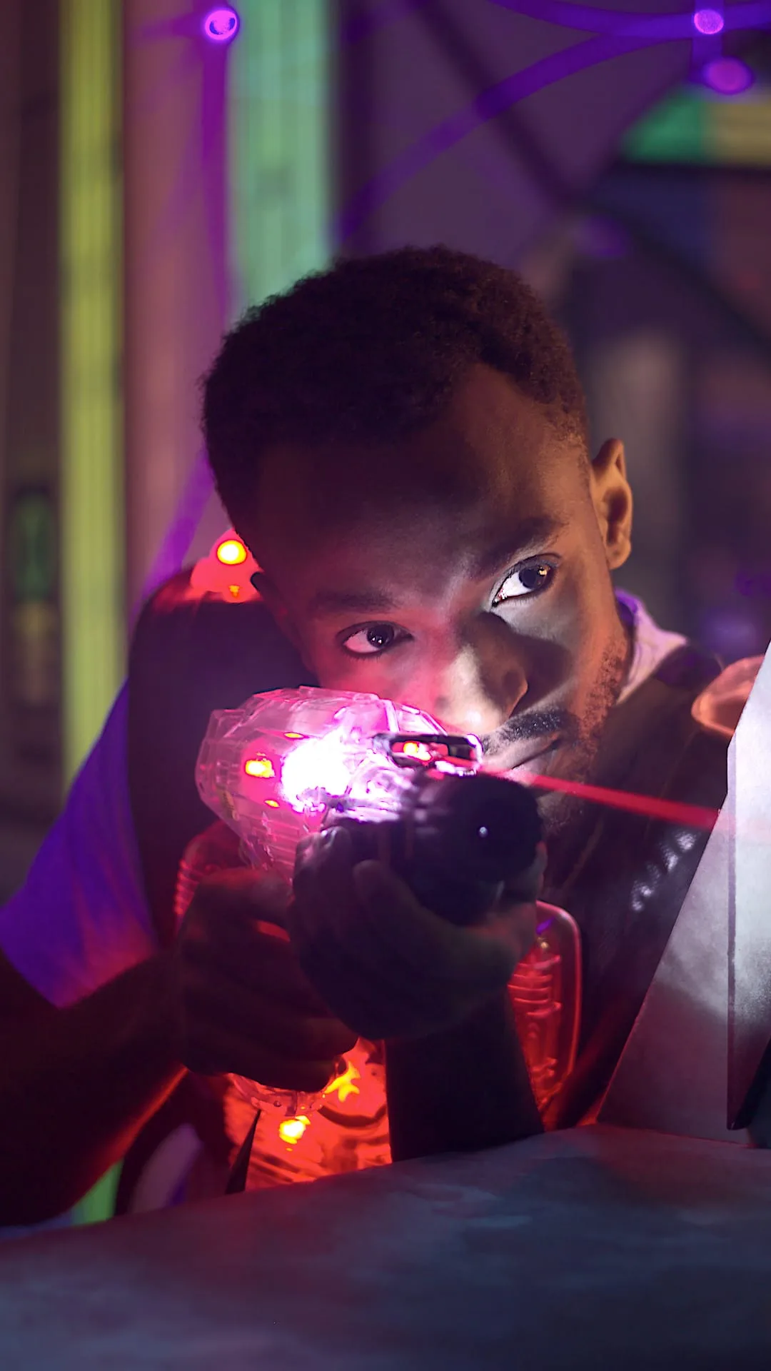 An adult playing Laser Tag in Sussex